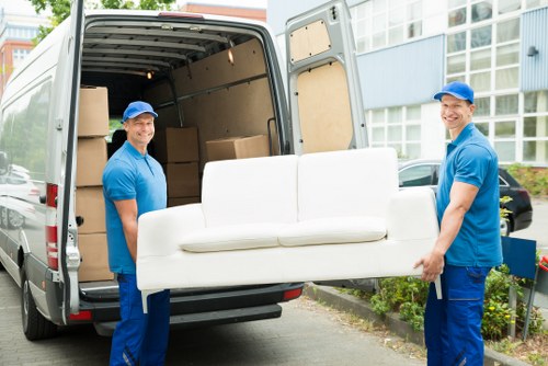 Removal team loading furniture for a home move in Lambeth