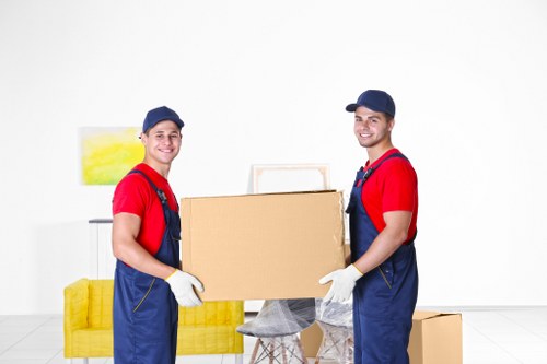 Removal van and packed boxes for a house move in Lambeth