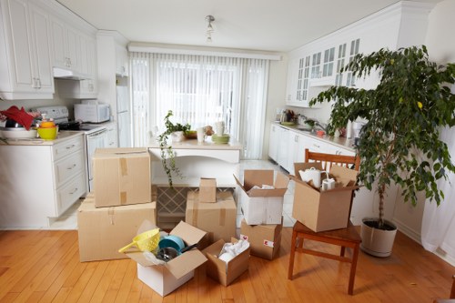 Furniture being carefully moved into a removal vehicle