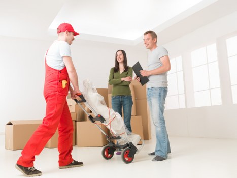 Removal staff reviewing safety procedures before completing a move