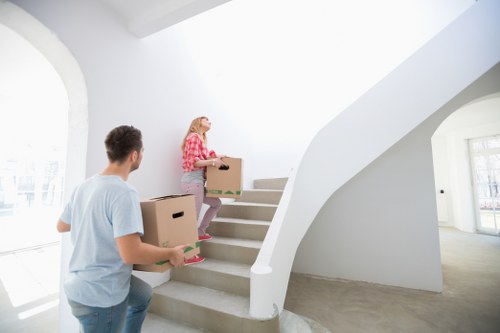 Loading furniture and boxes into a removal truck in Lambeth