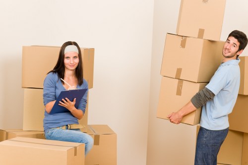 Local moving truck handling furniture and boxes in South London