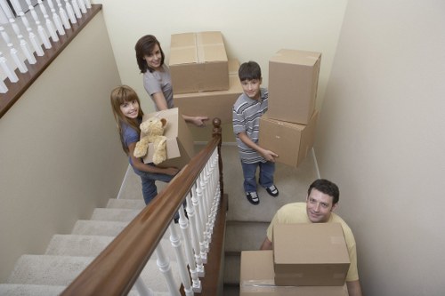 Moving boxes and furniture prepared for transport in Lambeth